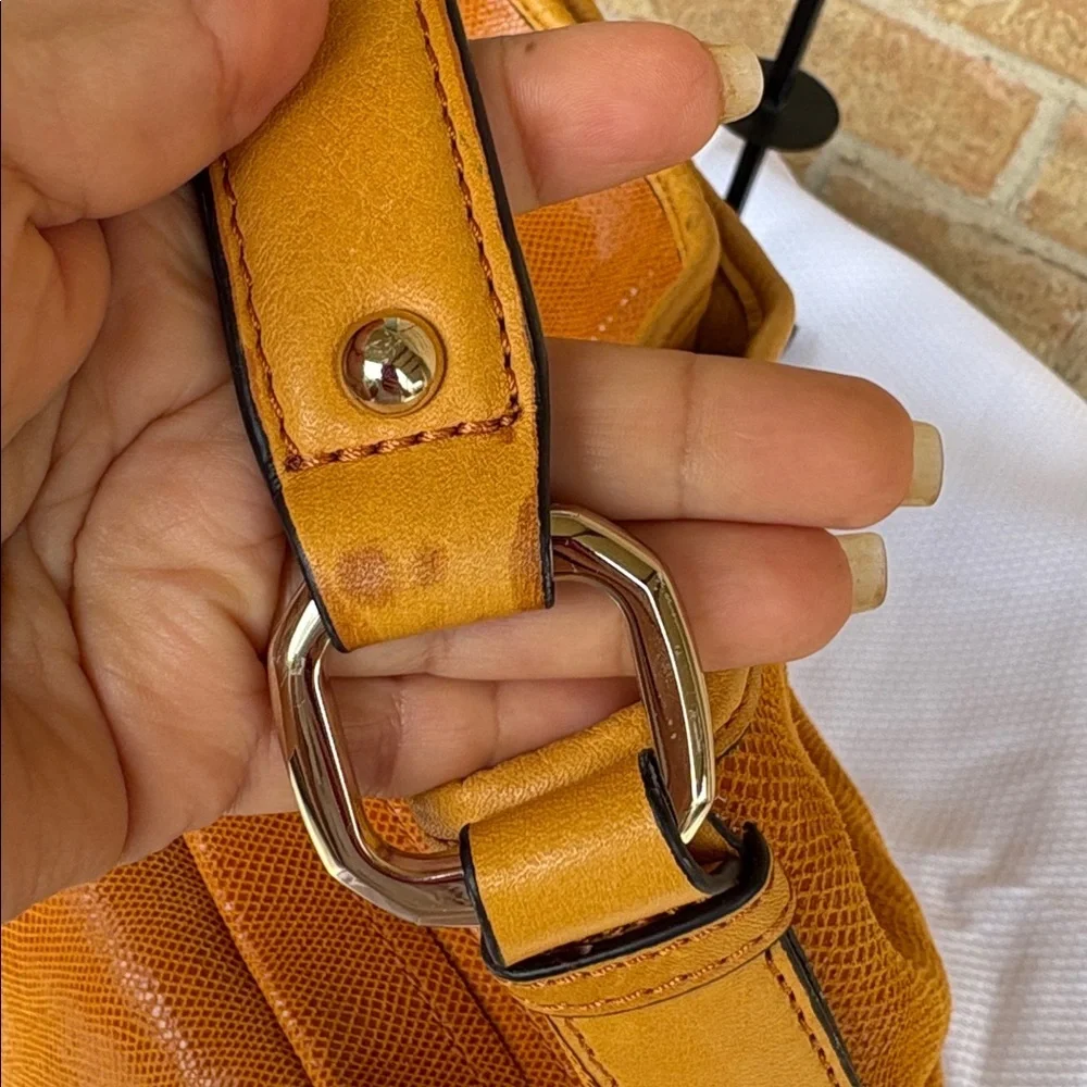 B. Makowsky Orange Hobo Bag